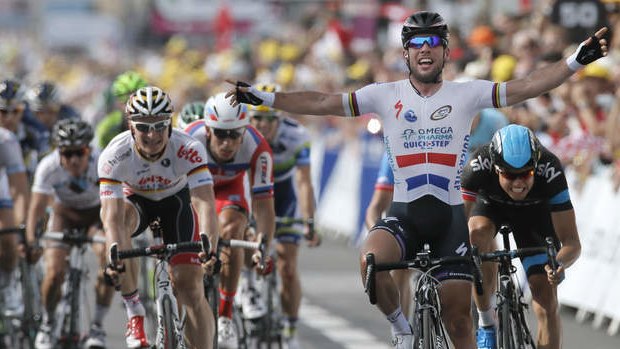 Britain's Mark Cavendish celebrates as he crosses the finish line ahead of Edvald Boasson Hagen of Norway, second place, right, Peter Sagan of Slovakia, third, far left, and Andre Greipel of Germany, centre and fourth place, to win the fifth stage of the Tour de France in Marseille.