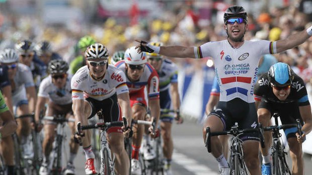 Britain's Mark Cavendish celebrates as he crosses the finish line ahead of Edvald Boasson Hagen of Norway, second place, right, Peter Sagan of Slovakia, third, far left, and Andre Greipel of Germany, centre and fourth place, to win the fifth stage of the Tour de France in Marseille.