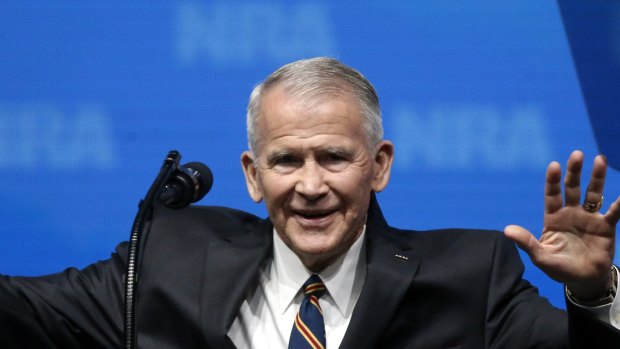 Oliver North acknowledges at the National Rifle Association-Institute for Legislative Action Leadership Forum in Dallas.
