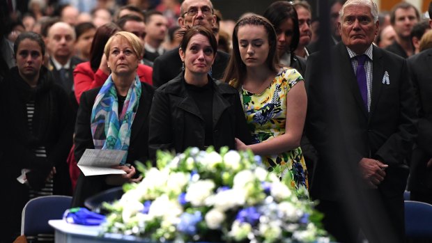 Brett Forte's wife Susan and daughter Emma at his funeral in Toowoomba last June.