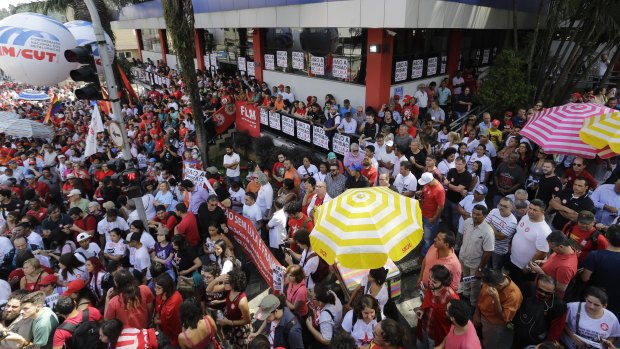 Supporters of Brazil's former President Luiz Inacio Lula da Silva gather in front of the metal workers union headquarters in Sao Bernardo do Campo, Brazil.