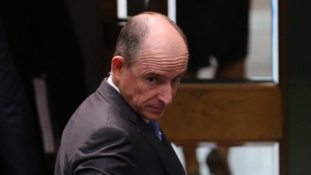 Human Services Minister Stuart Robert leaves the chamber after question time on Tuesday.