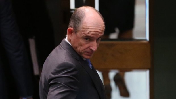 Human Services Minister Stuart Robert leaves the chamber after question time on Tuesday.