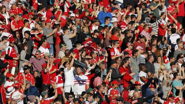 Lions fans celebrate a try during a Super Rugby semi-final match between the Lions and the Highlanders at Ellis Park in 2016.