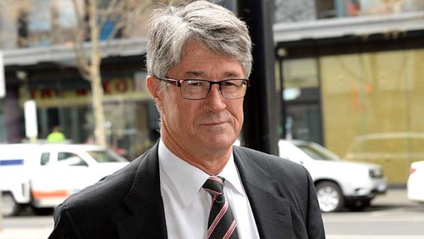 AFL Commission Chairman Mike Fitzpatrick arrives at AFL House on Tuesday.
