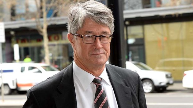 AFL Commission Chairman Mike Fitzpatrick arrives at AFL House on Tuesday.