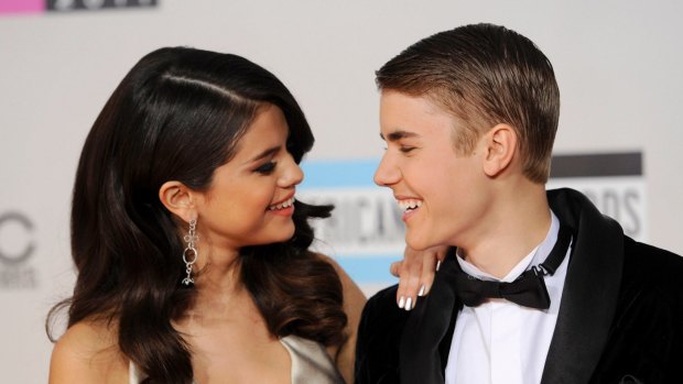 Selena Gomez, left, and Justin Bieber at the 39th Annual American Music Awards on Sunday, Nov. 20, 2011 in Los Angeles. 