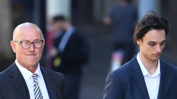 David (left) and Lachlan Pirie arriving at the District Court in Brisbane. 