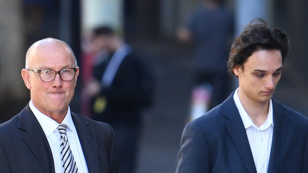 David (left) and Lachlan Pirie arriving at the District Court in Brisbane. 