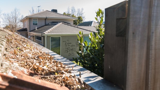 Graffiti on the back walls of the home in Hawthorn East. 