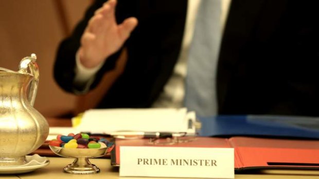 Prime Minister Tony Abbott meets with his ministry in the cabinet room at Parliament House in Canberra on Wednesday.