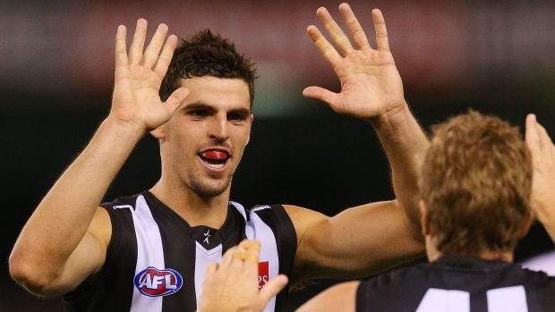 Scott Pendlebury celebrates a goal on the way to Collingwood's 26-point win