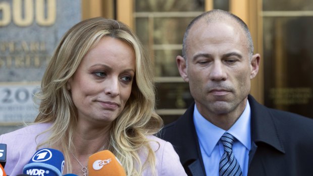 Lawsuits involving adult film actress Stormy Daniels (pictured with her lawyer Michael Avenatti) are becoming a major headache for Donald Trump. 