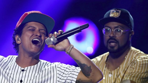 Bruno Mars deploy his affable pseudo-funk in the name of L'Oreal hair care products.