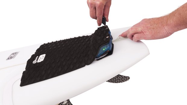 The Shark Shield product on a surf board. 