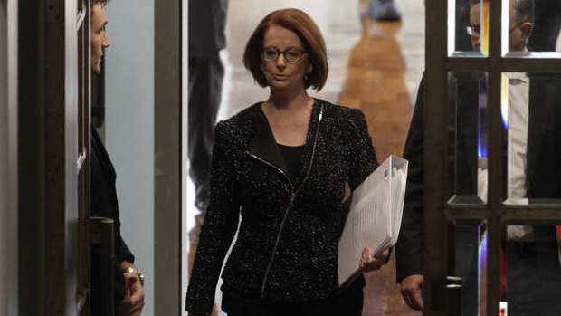 Prime Minister Julia Gillard enters the Chamber