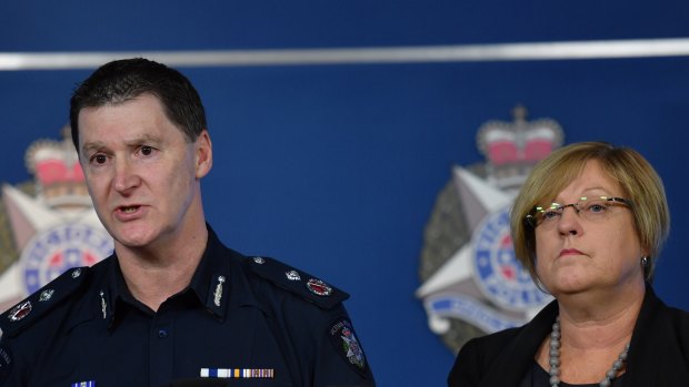 Police Minister Lisa Neville (pictured here with Deputy Commissioner Shane Patton) has given police unprecedented powers to crack down on guns.