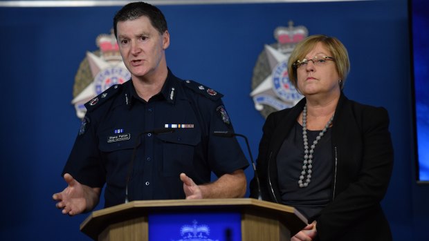 Police Minister Lisa Neville (pictured here with Deputy Commissioner Shane Patton) has given police unprecedented powers to crack down on guns.