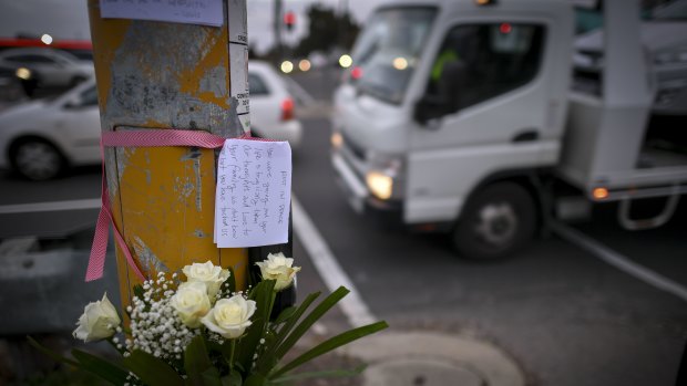 Louis Datoi placed flowers and a note at the scene.