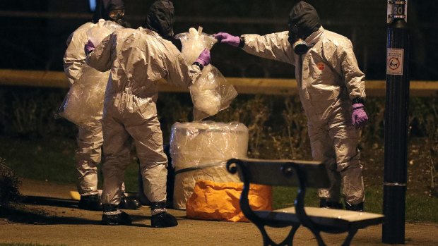 Investigators in protective suits at the scene of the nerve agent attack in Salisbury, England.