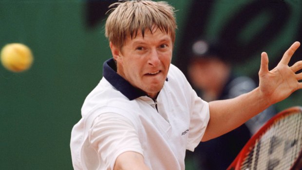 Forced into retirement: Yevgeny Kafelnikov.