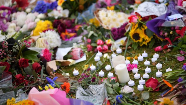 Flowers laid at the site where Melbourne comedian Eurydice Dixon was found.