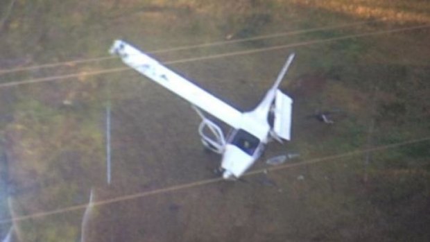 The plane is worse for wear after an emergency landing in a residential area.