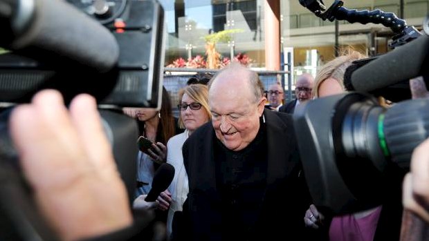 Adelaide Archbishop Philip Edward Wilson leaves court after being found guilty of concealing child sexual abuse.