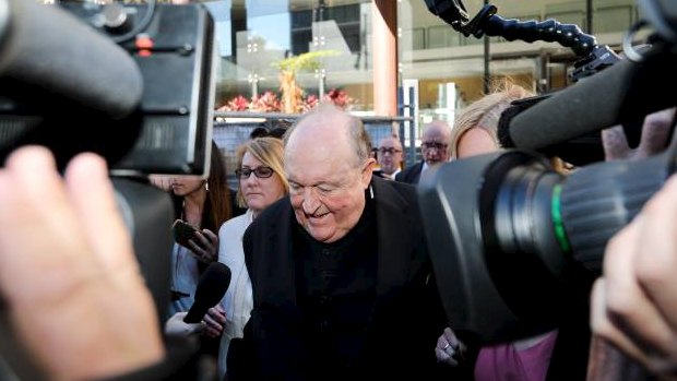 Adelaide Archbishop Philip Edward Wilson leaves court after being found guilty of concealing child sexual abuse.