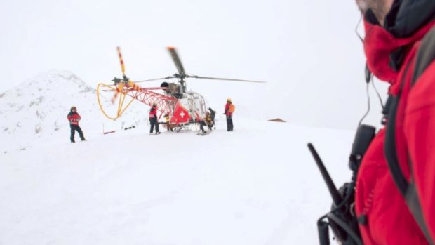 Swiss authorities' rescue helicopter in Alps.