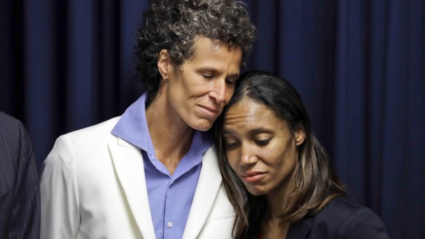 Bill Cosby accuser Andrea Constand, left, embraces prosecutor Kristen Feden after the verdict.