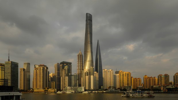 The Shanghai Tower, centre, one of the world's tallest, greenest buildings.