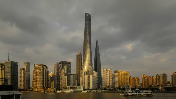 The Shanghai Tower, centre, one of the world's tallest, greenest buildings.