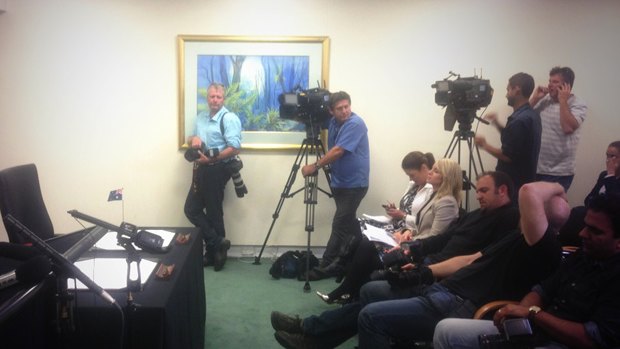 Media wait for the arrival of Prime Minister Kevin Rudd.