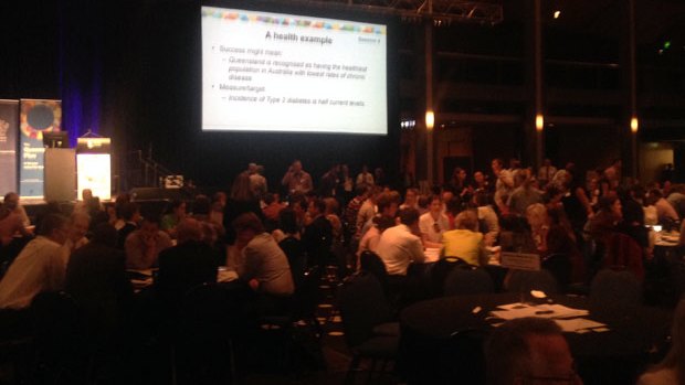 Delegates working in groups at the Queensland Plan.