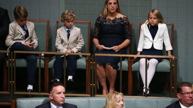 The Treasurer's family Xavier Hockey, Ignatius Hockey, Melissa Babbage and Adelaide Hockey listen to the budget reply speech in Parliament on Tuesday.