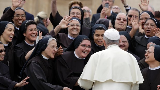 Pope Francis meets a group of Franciscan nuns