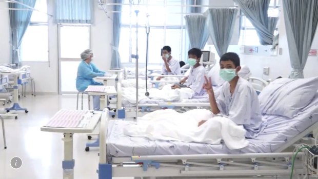 In this image made from video, released by the Thailand Government Spokesman Bureau, three of the 12 boys are seen recovering in their hospital beds after being rescued.