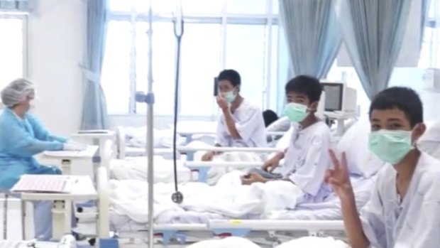 In this image made from video, released by the Thailand Government Spokesman Bureau, three of the 12 boys are seen recovering in their hospital beds after being rescued.