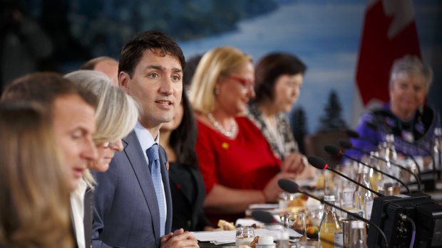 Justin Trudeau, Canada's prime minister, centre, speaks during the Group of Seven.