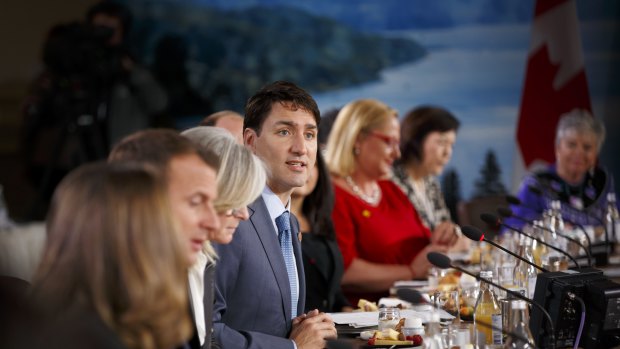 Justin Trudeau, Canada's prime minister, centre, speaks during the Group of Seven.