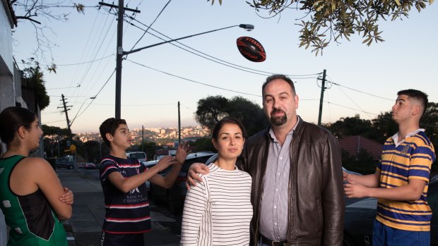Lamya and Ahmed Sadi, with their children, Amina, 14, Sonny, 12, and Hamzah, 16, spend Saturdays driving between their different sports grounds in Sydney.