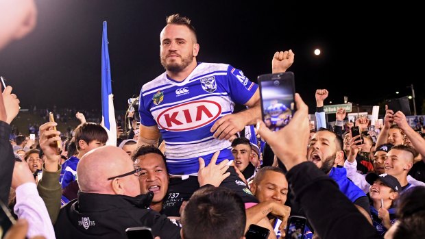 Bittersweet: Josh Reynolds carried off the field at Belmore after his final game at the ground for the Dogs.