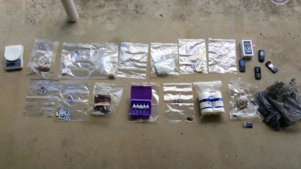 Items seized in the raids on a South Brisbane cafe.