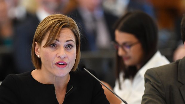 Queensland Deputy Premier Jackie Trad says her 10-year-old son was aggressively questioned by a 'claim farmer' who called her home.