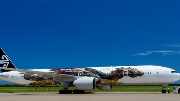 Firey landing...the 54-metre dragon on Air New Zealand's Boeing 777-300.