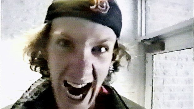 A Columbine High School shooter yells into the camera in this image made from video released by the Jefferson County Sheriff's department in 2004.  