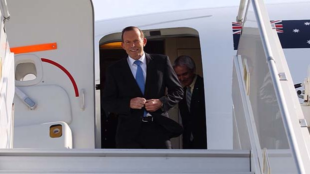 Prime Minister Tony Abbott arrives in Paris.
