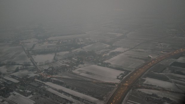 A mixture of haze and smog is seen over Warsaw on a February winter's day. 