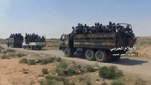 A convoy of Syrian military vehicles after its troops captured the Naseeb border crossing last week.